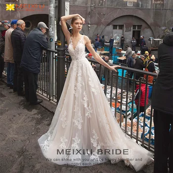 Álomrátétes V-nyakú szexi egyedi esküvői ruha Virágos design Trailline A-vonalú utazási fotózás A menyasszonyi ruhák rajongói