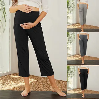 Kismama lábú nadrág Terhes nők varrat nélküli rugalmas High Wasit jóga nadrág Terhesség alkalmi puha bő nadrág zsebekkel