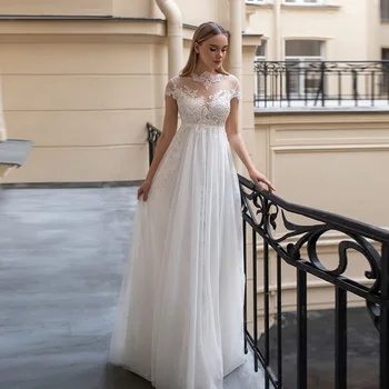 TIXLEAR női A-Line hercegnő Boho csipke rátétes strand esküvői ruha menyasszonyi sapka ujjak illúzió vissza menyasszonyi ruhák hosszú nyár
